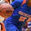 Wood-steel-harder-sign-deja-snipes-basketball-player.